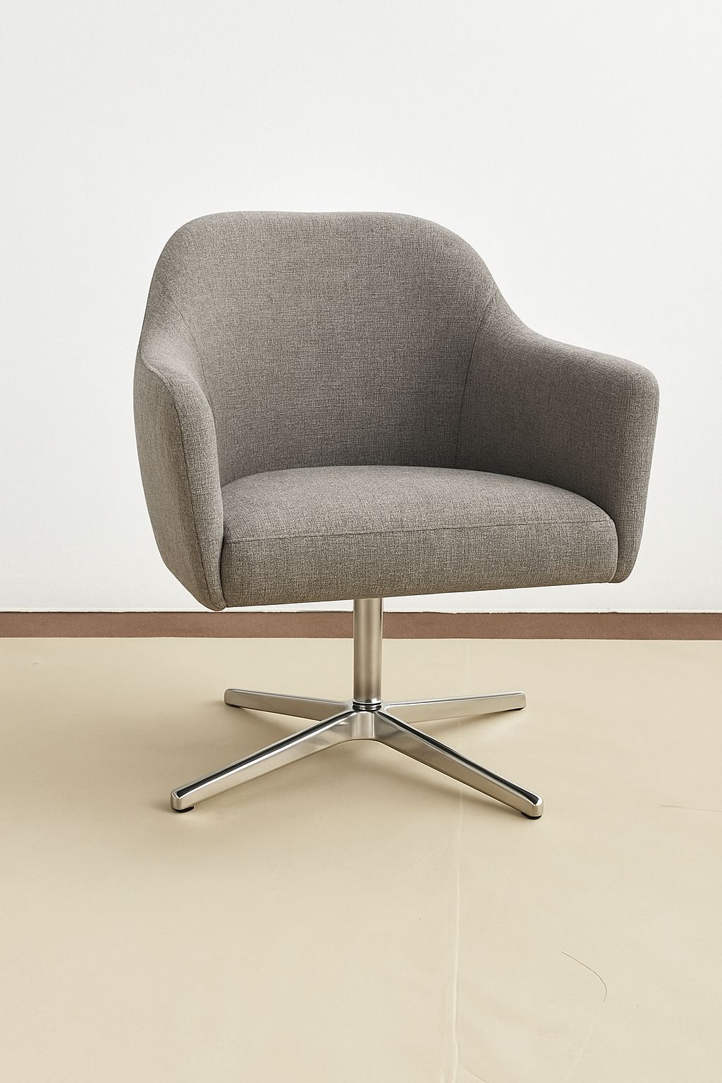 The Grey Swivel Armchair